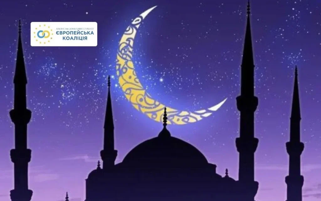 A greeting card for Eid al-Adha: silhouettes of a mosque and an ornamented crescent moon